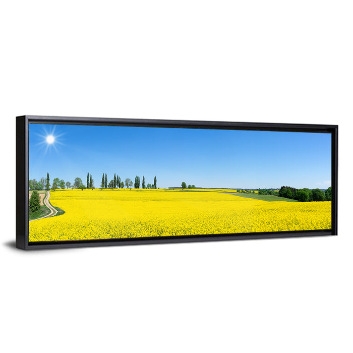 Winding Path Through Rapeseed Field Wall Art as a framed canvas
