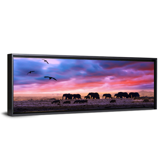 Elephants at Savannah Sunset Wall Art as a framed canvas