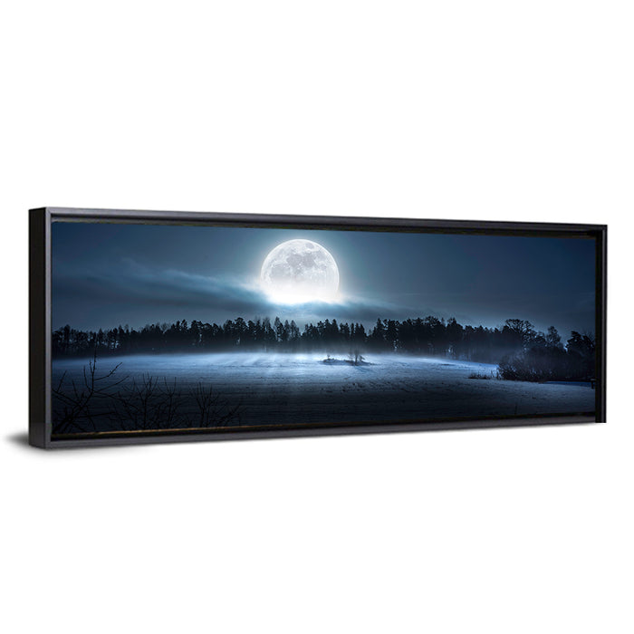 Moon Rising Over Forest Wall Art as a framed canvas
