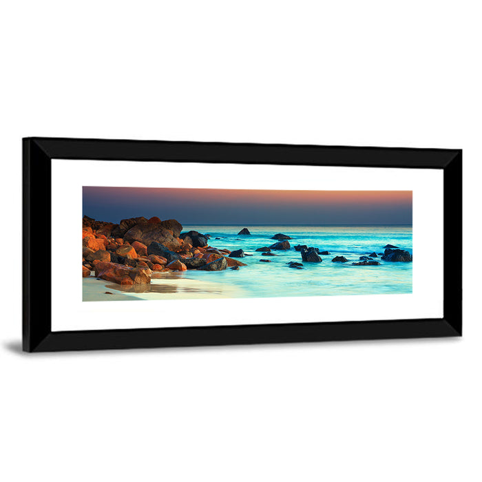 Sunset Over Volcanic Shoreline Wall Art as a framed print