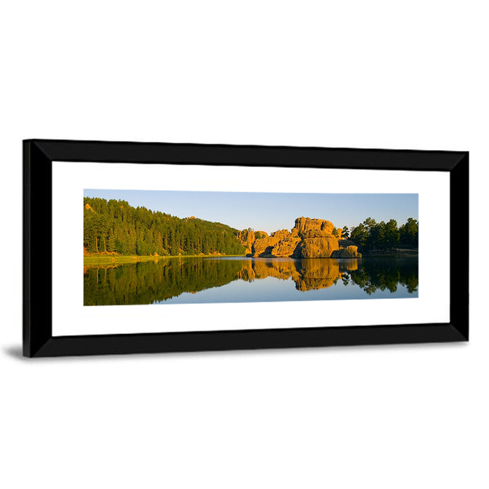 Sylvan Lake Golden Hour Reflection Wall Art as a framed print