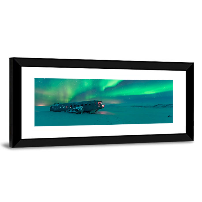 Northern Lights Over Sólheimasandur Wreck Wall Art as a framed print