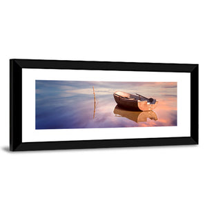 Lonely Boat At Sunset Wall Art