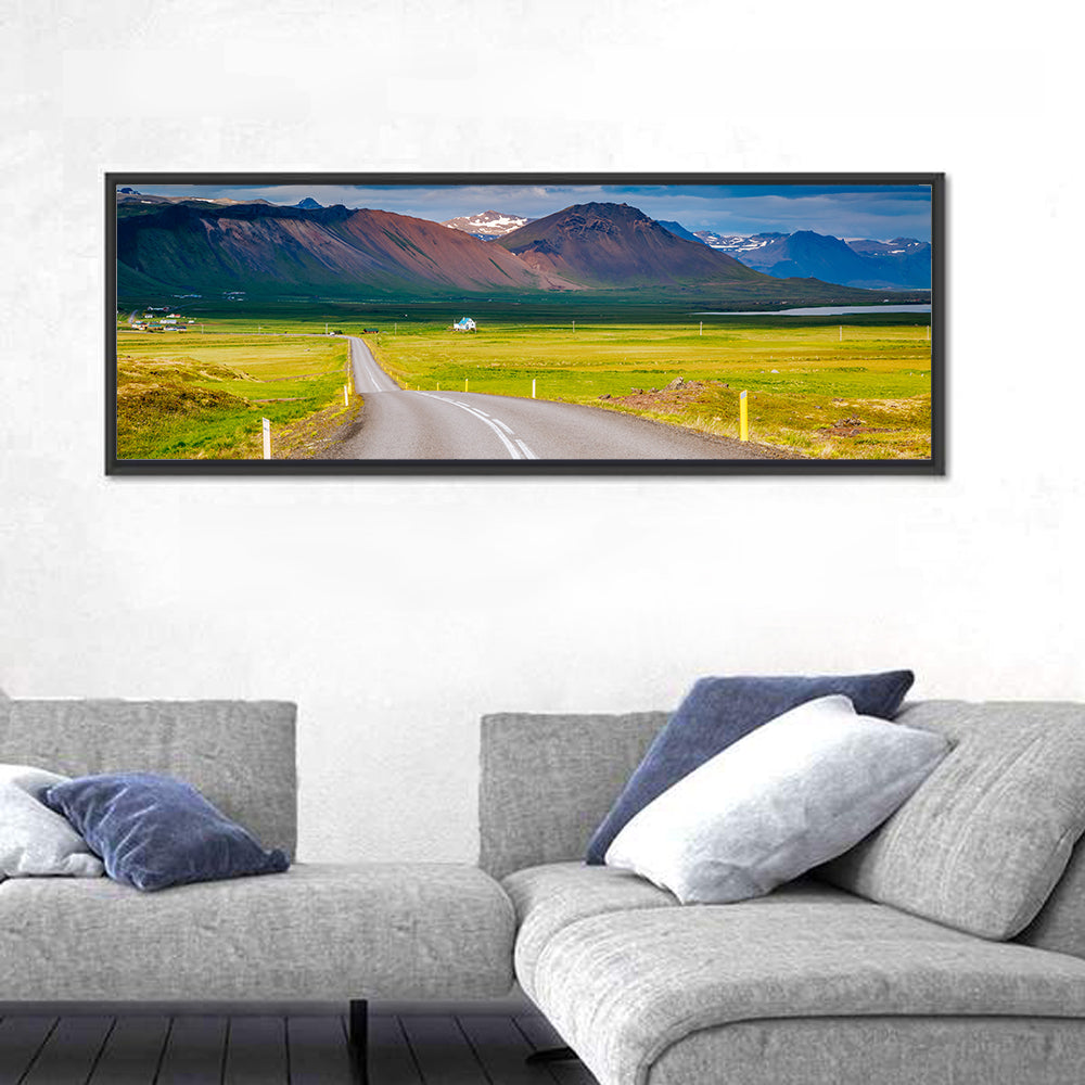 Icelandic Winding Road Toward Mountains Wall Art in a room, panoramic