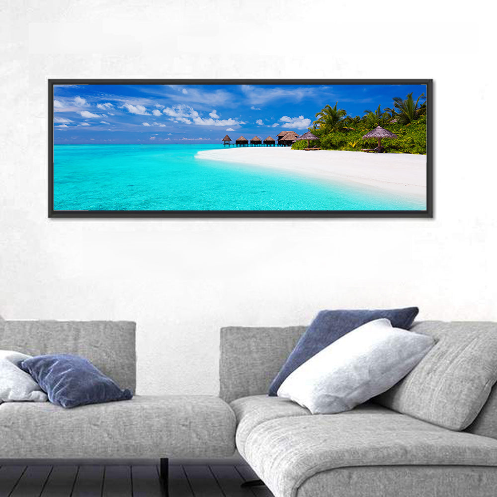 Turquoise Island with Water Bungalows Wall Art in a room, panoramic