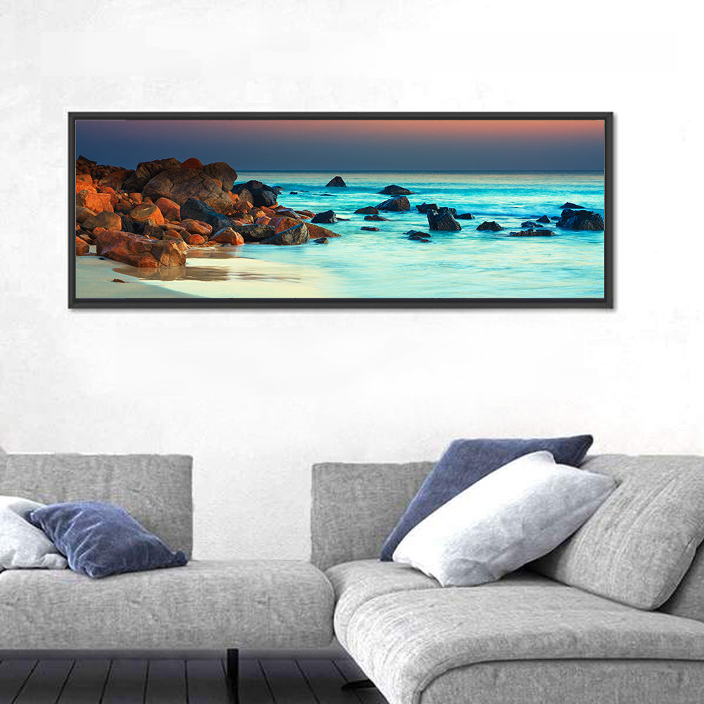Sunset Over Volcanic Shoreline Wall Art in a room, panoramic