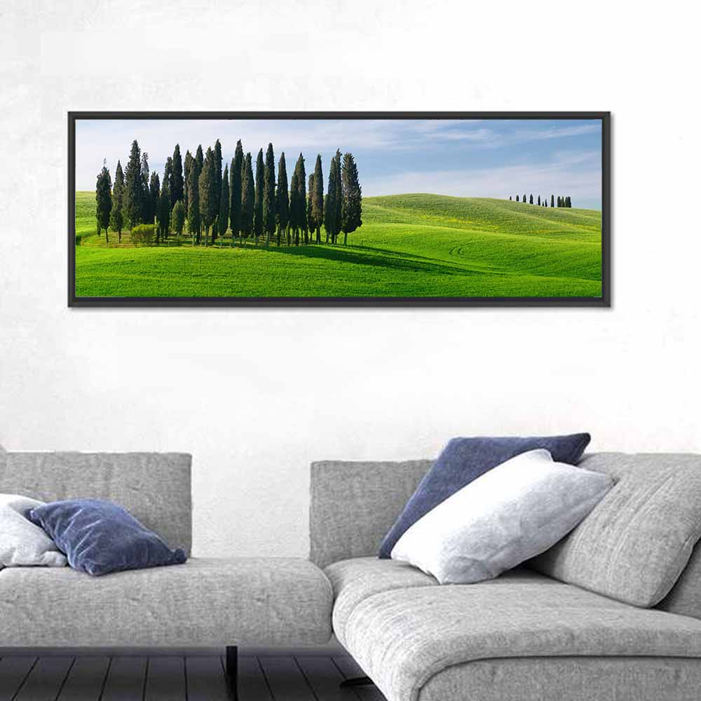 Tuscany Rolling Hills with Cypresses Wall Art in a room, panoramic