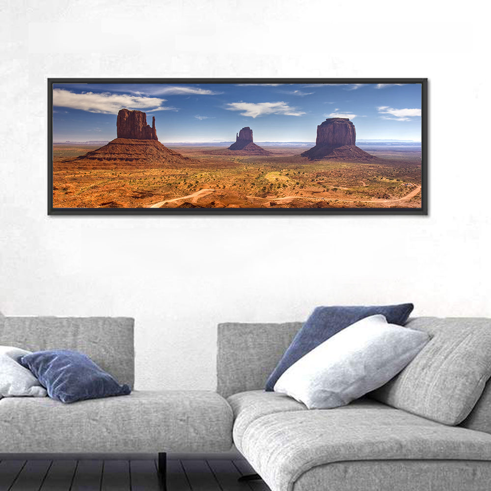 Monument Valley Buttes Wall Art in a room, panoramic