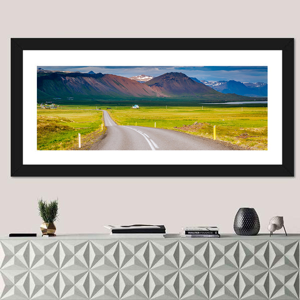 Icelandic Winding Road Toward Mountains Wall Art in a room, panoramic