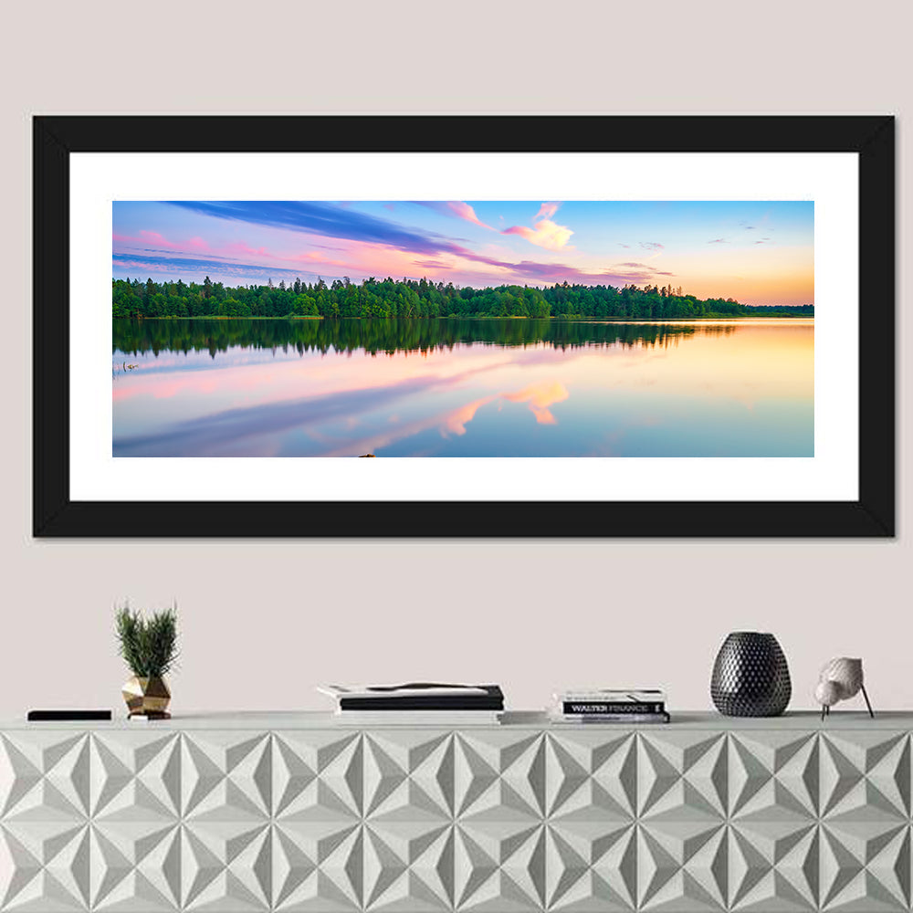 Colorful Sunset Over Forest Lake Wall Art in a room, panoramic