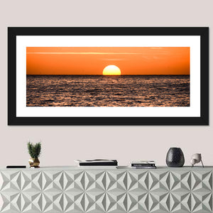 Sun Setting In The Sea Wall Art