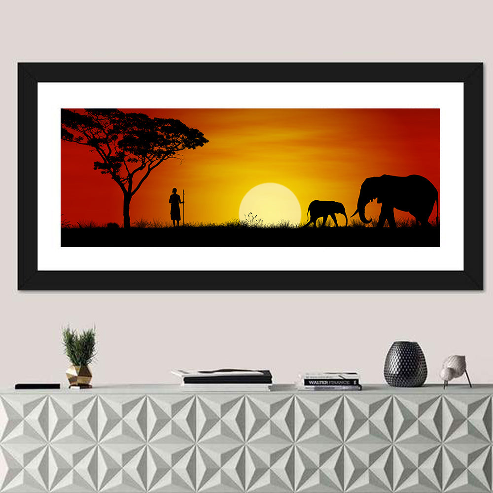 Massai Warrior and Elephants at Sunset Wall Art in a room, panoramic