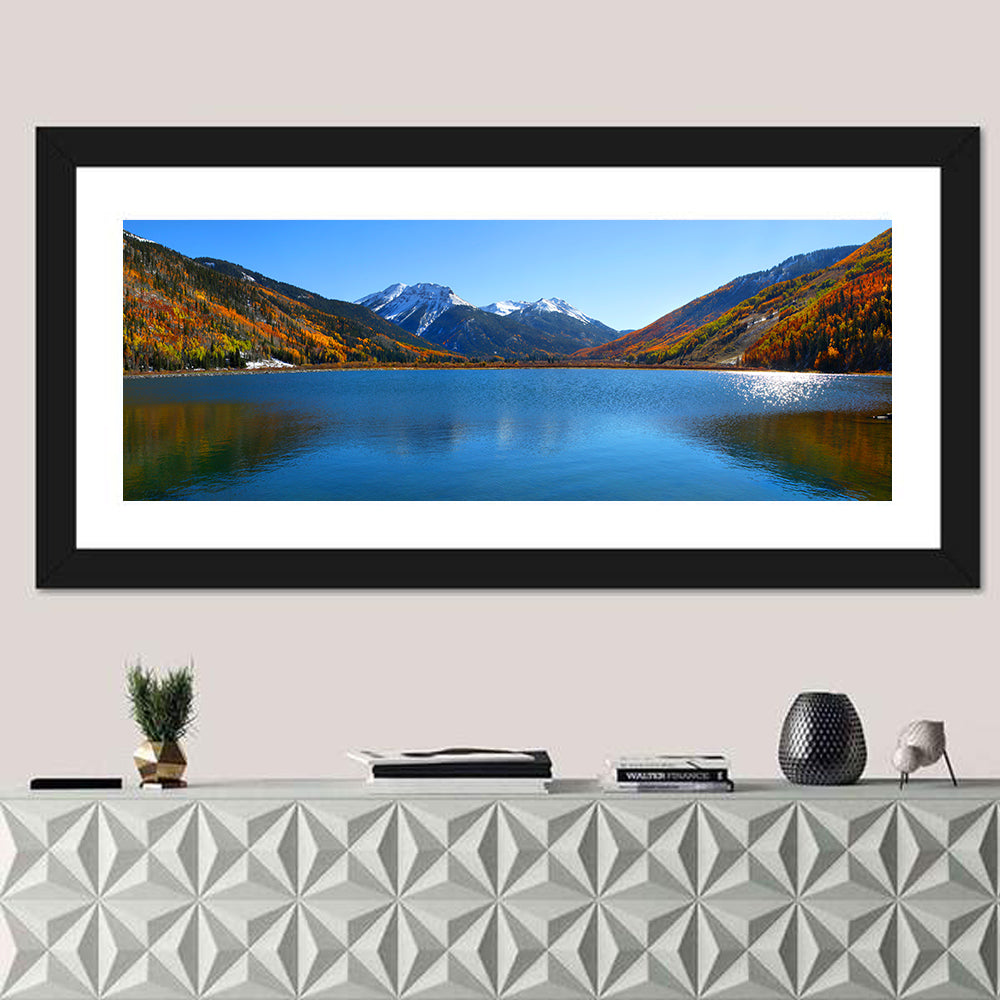 Crystal Lake Colorado Autumn Reflection Wall Art in a room, panoramic