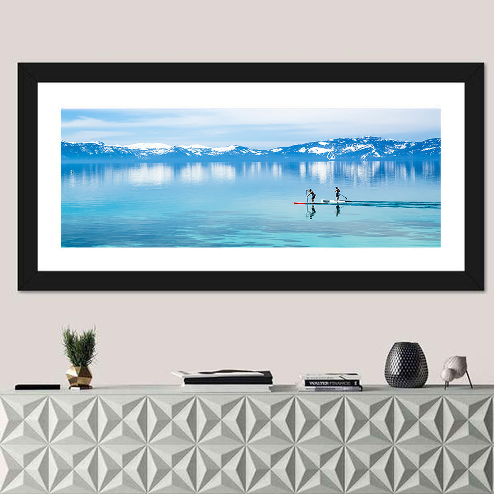 Two Paddleboarders on Mountain Lake Wall Art in a room, panoramic