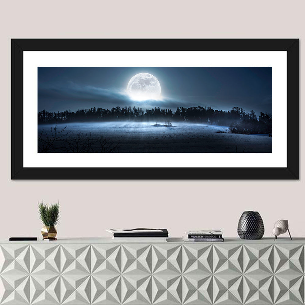 Moon Rising Over Forest Wall Art in a room, panoramic