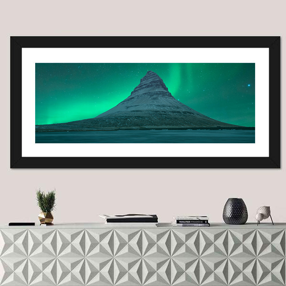 Northern Lights Over Kirkjufell Wall Art in a room, panoramic
