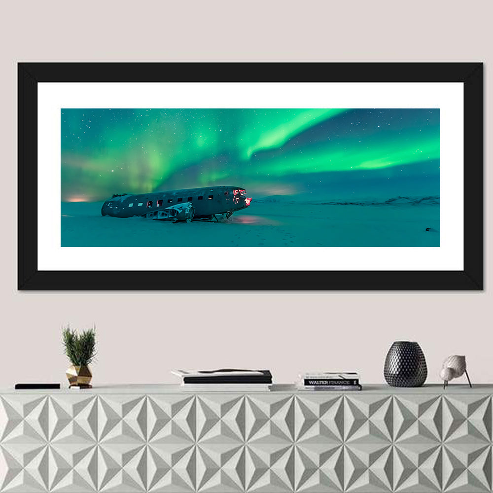 Northern Lights Over Sólheimasandur Wreck Wall Art in a room, panoramic