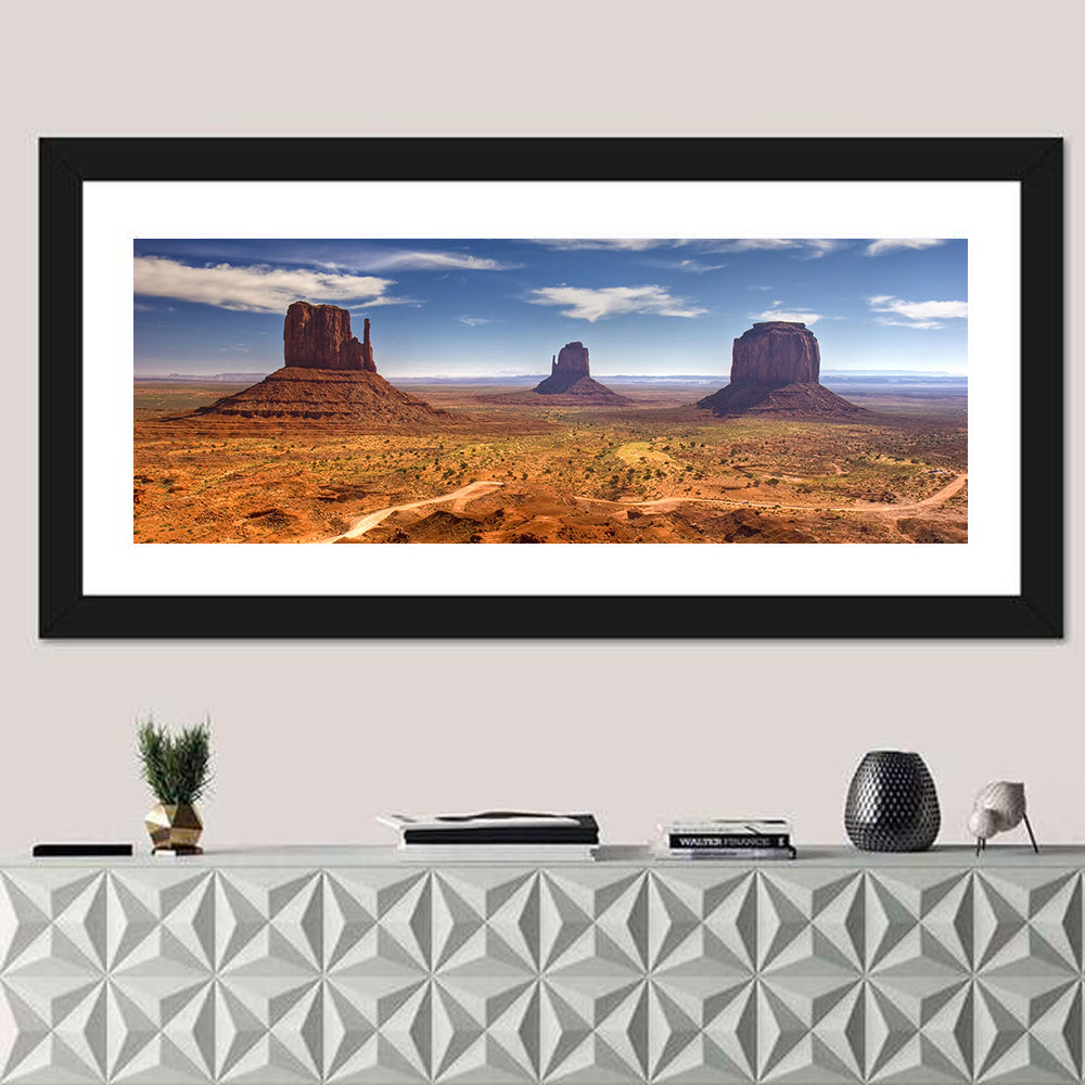 Monument Valley Buttes Wall Art in a room, panoramic