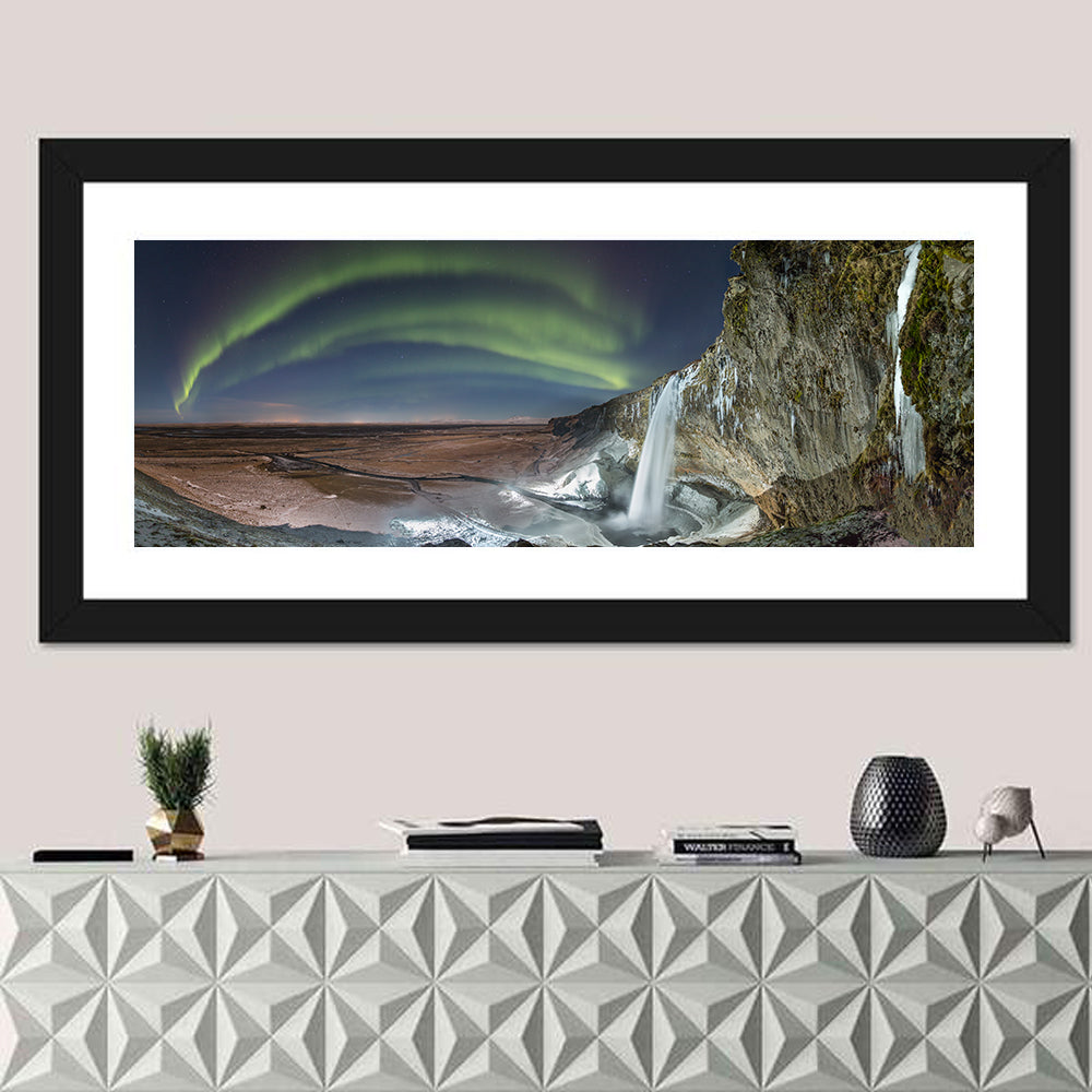 Seljalandsfoss Waterfall Nightscape Wall Art in a room, panoramic