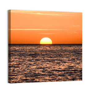 Sun Setting In The Sea Wall Art