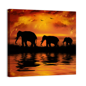 Elephants In Sunset Wall Art