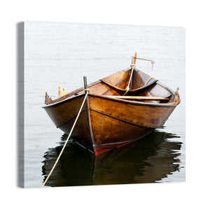 Wooden Row Boat On Water Wall Art