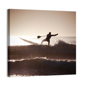 Silhouette Of A Man Paddle Boarding Wall Art