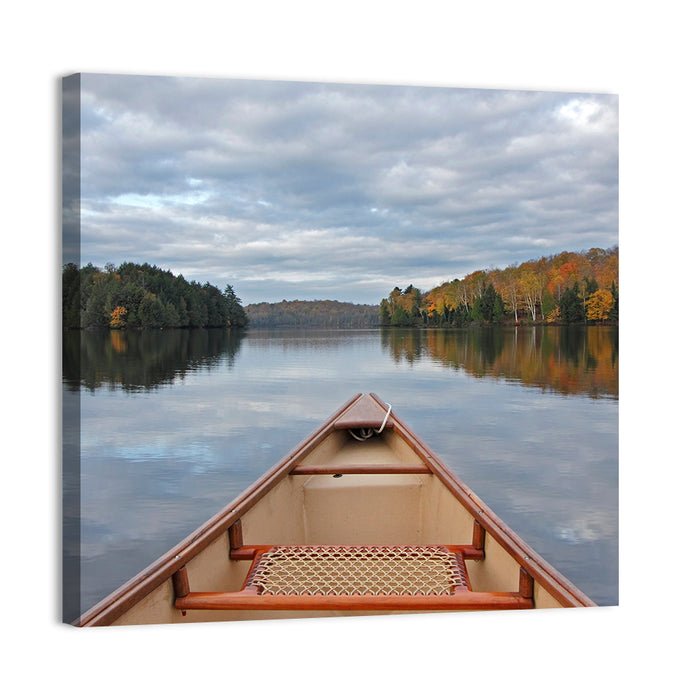 Overcast Canoe Bow on Autumn Lake Wall Art as a canvas print