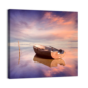 Lonely Boat At Sunset Wall Art