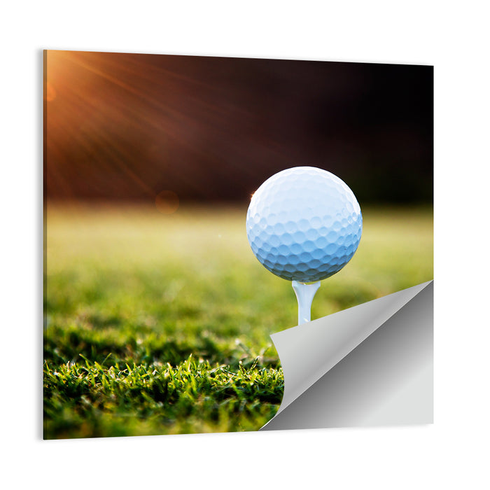 Golf Ball on Tee at Sunset Wall Art as a poster print