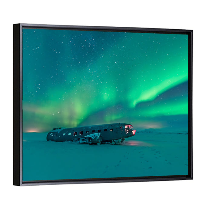 Northern Lights Over Sólheimasandur Wreck Wall Art as a framed canvas