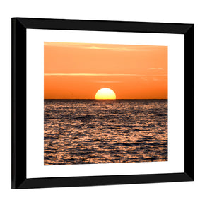 Sun Setting In The Sea Wall Art