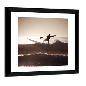 Silhouette Of A Man Paddle Boarding Wall Art