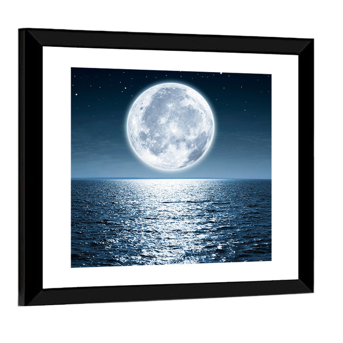 Full Moon Rising Over Ocean Wall Art as a framed print