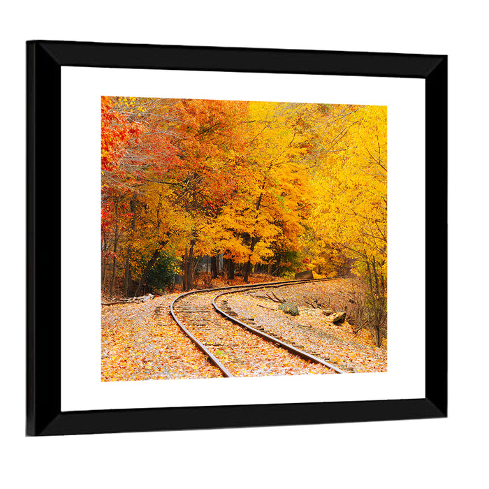 Curving Railroad Through Autumn Forest Wall Art as a framed print