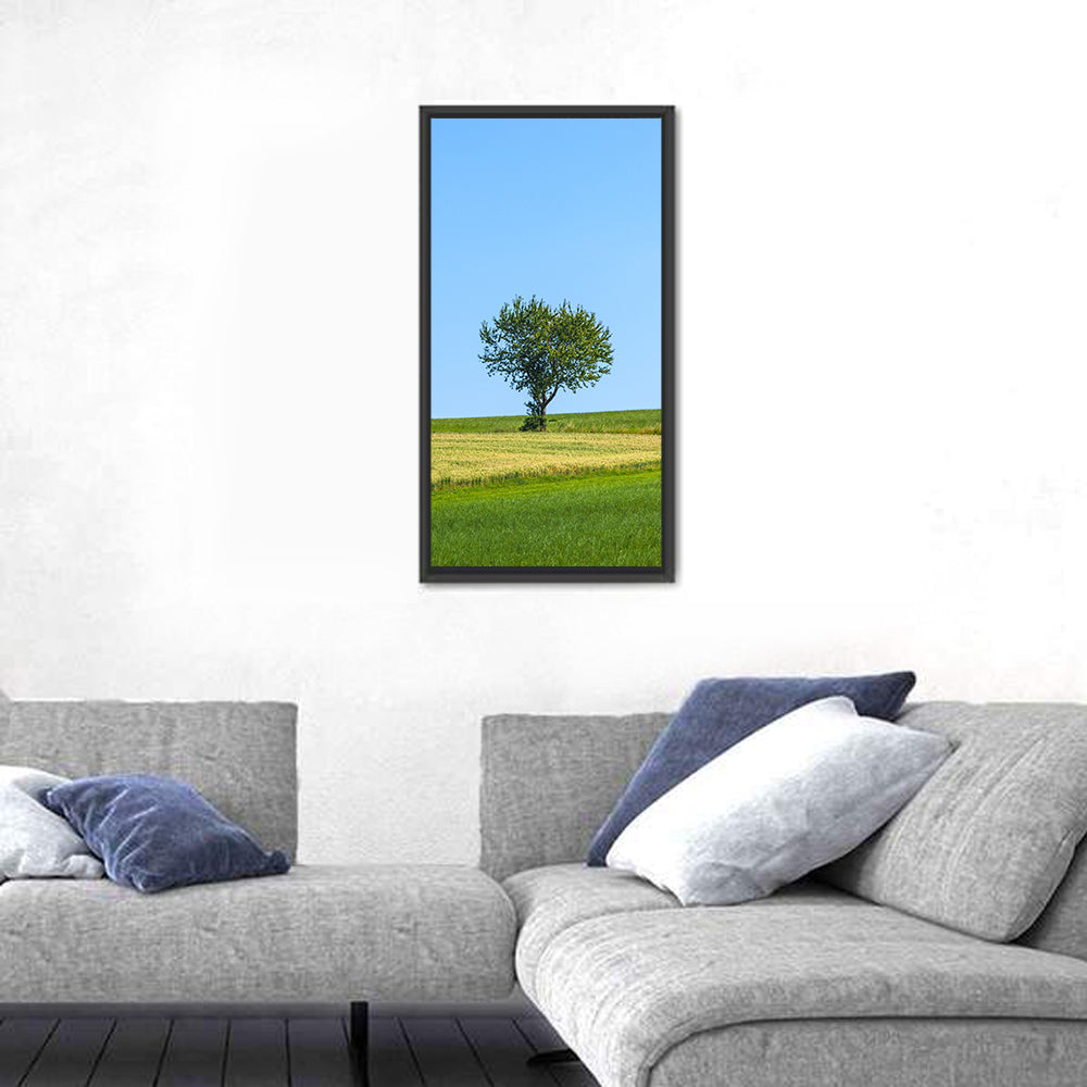 Solitary Tree on Rolling Meadow Wall Art in a room, portrait