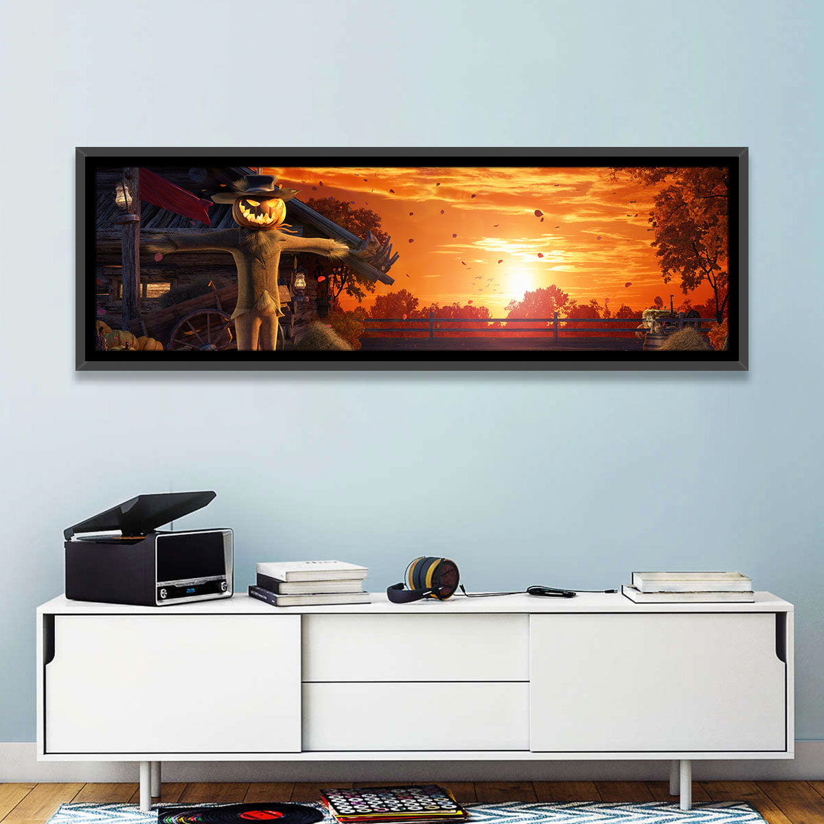 Glowing Pumpkin Scarecrow at Dusk Wall Art in a room, panoramic