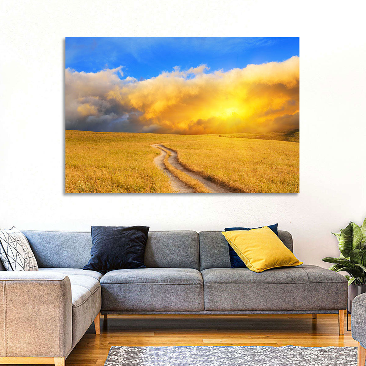Sunlit Meadow Path with Dramatic Clouds Wall Art in a room, landscape