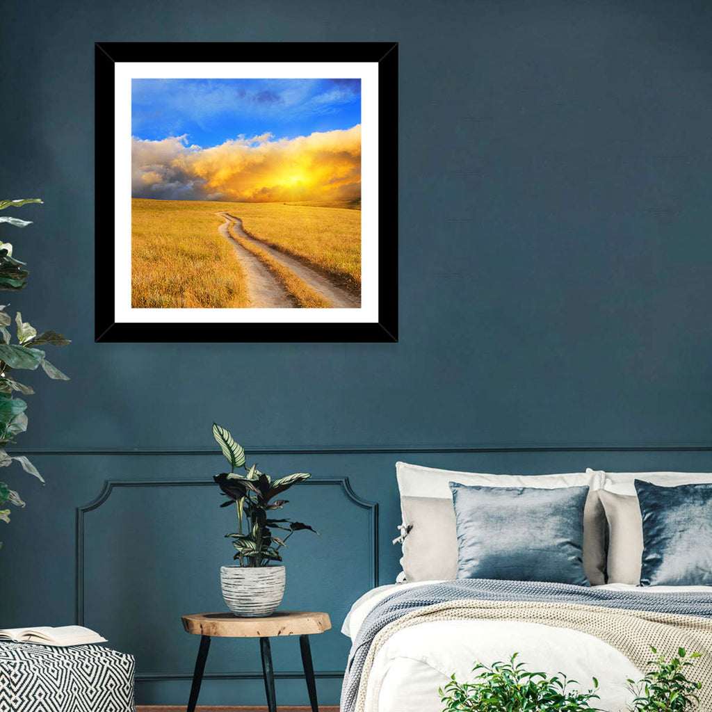 Sunlit Meadow Path with Dramatic Clouds Wall Art