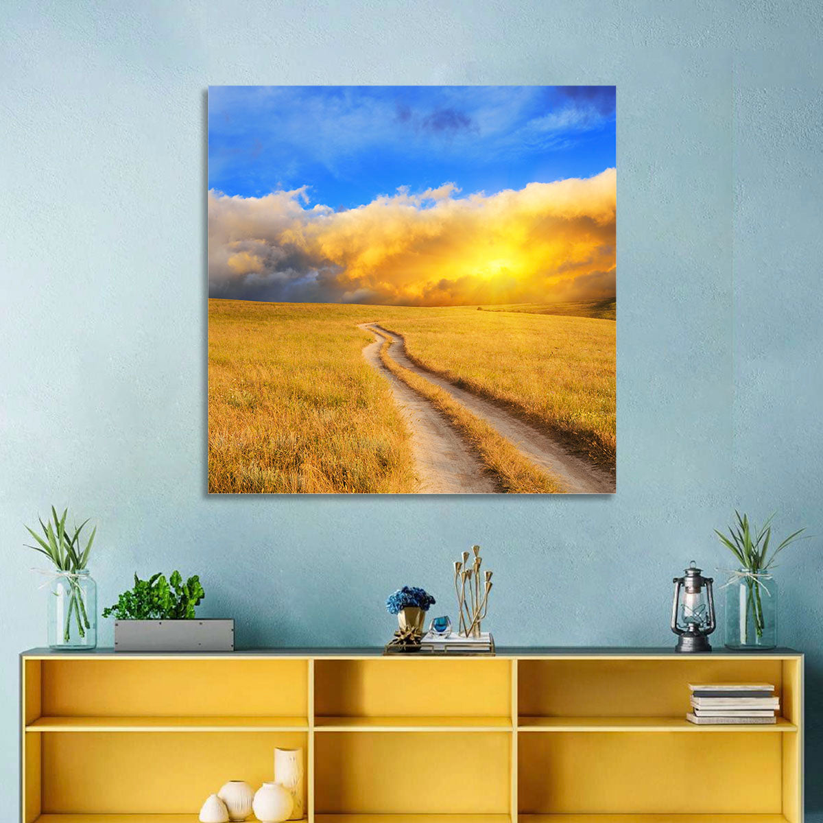 Sunlit Meadow Path with Dramatic Clouds Wall Art in a room, landscape