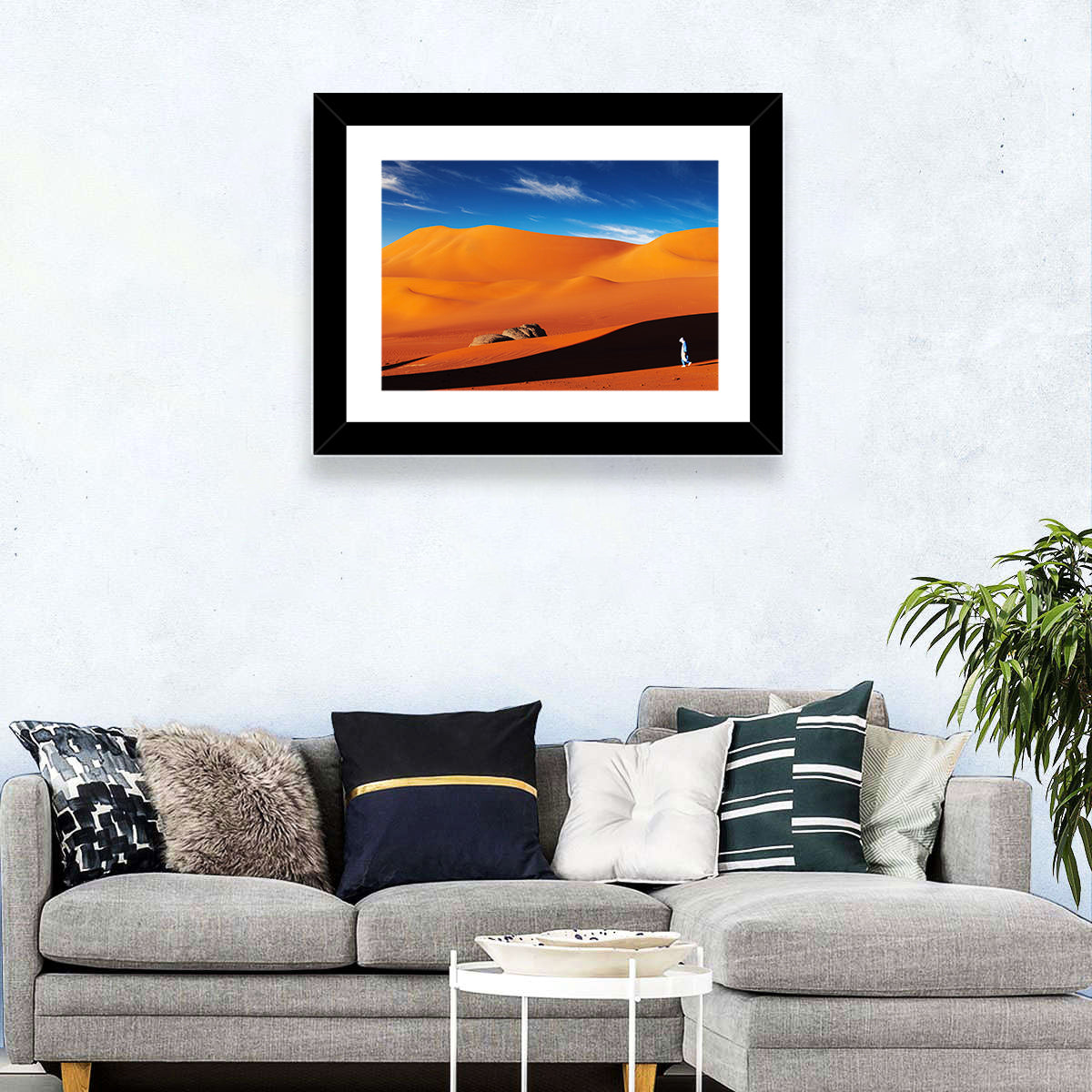 Solitary Figure on Sahara Dunes Wall Art in a room, landscape