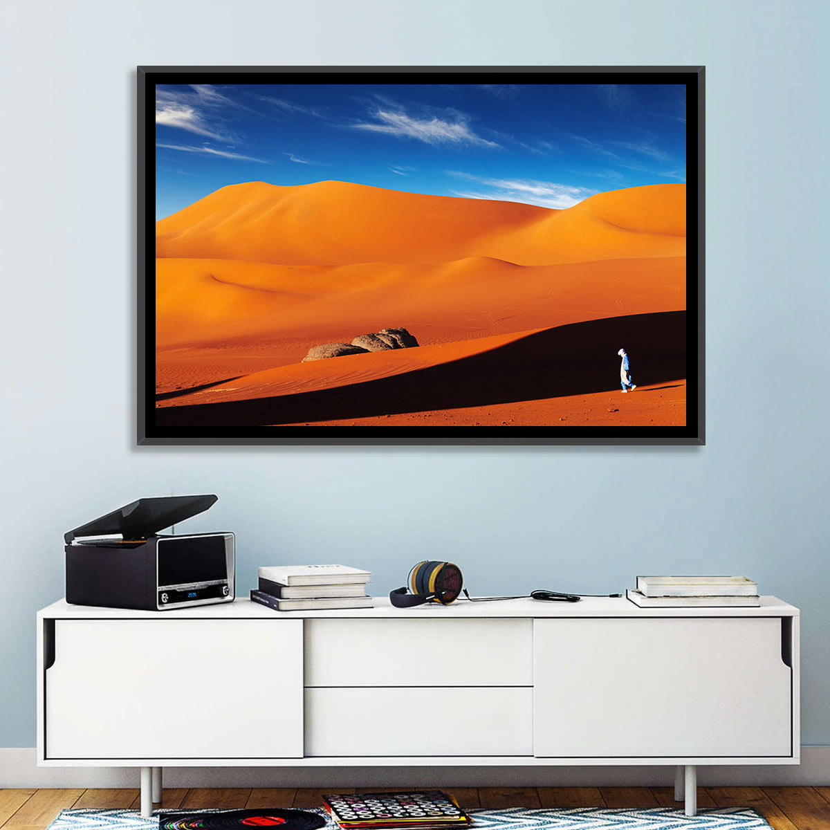 Solitary Figure on Sahara Dunes Wall Art in a room, landscape