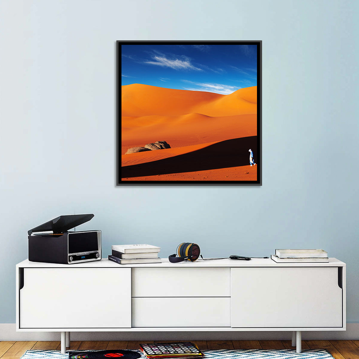 Solitary Figure on Sahara Dunes Wall Art in a room, landscape