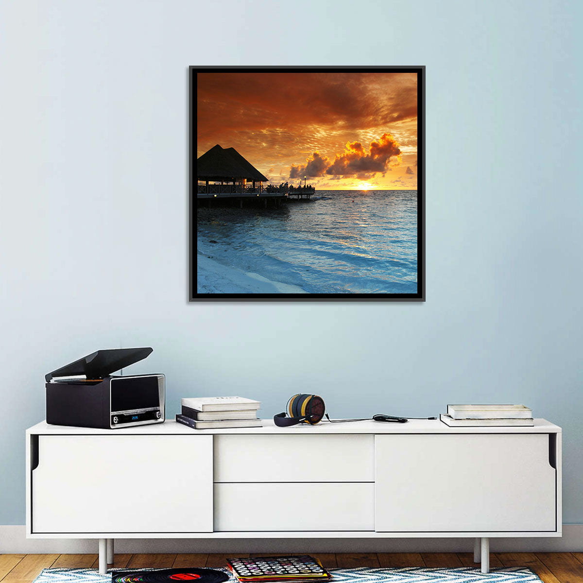 Overwater Bungalow Sunset Pier Wall Art in a room, landscape