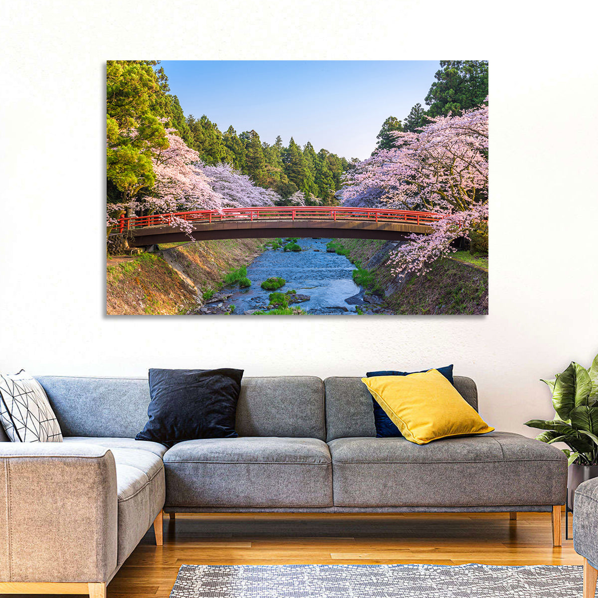 Arched Red Bridge with Cherry Blossoms Wall Art in a room, landscape