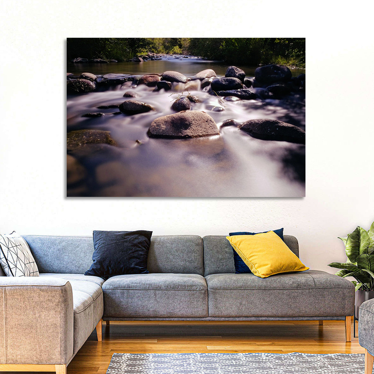 Truckee River Sunlit Rocks Wall Art in a room, landscape
