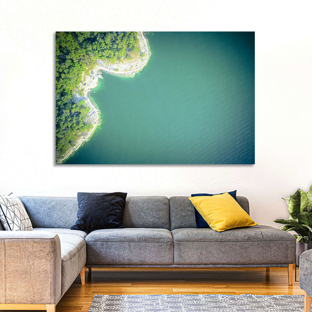L-shaped Coastline Over Teal Lake Wall Art in a room, landscape