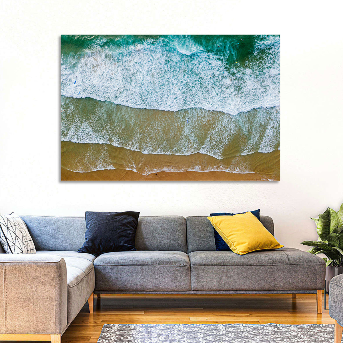 Aerial Teal Beach with Surfers Wall Art in a room, landscape