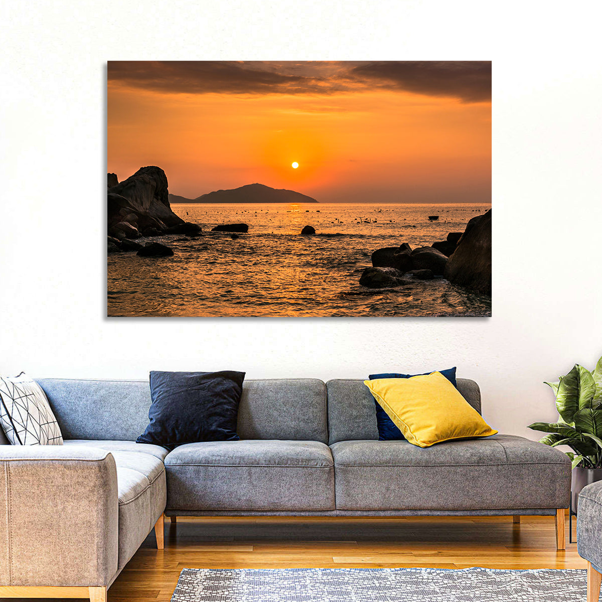 Orange Sunrise Over Rocky Coast Wall Art