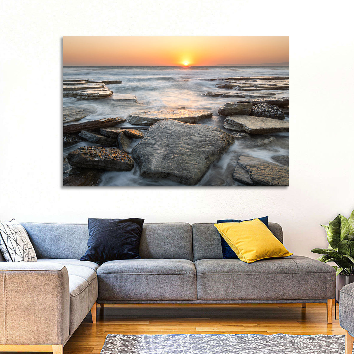Golden Hour Rock Shoreline Sunset Wall Art in a room, landscape